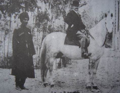 Reza Khan with the Netherland's ambassador to Iran. Reza Khan was then a Cossack officer.